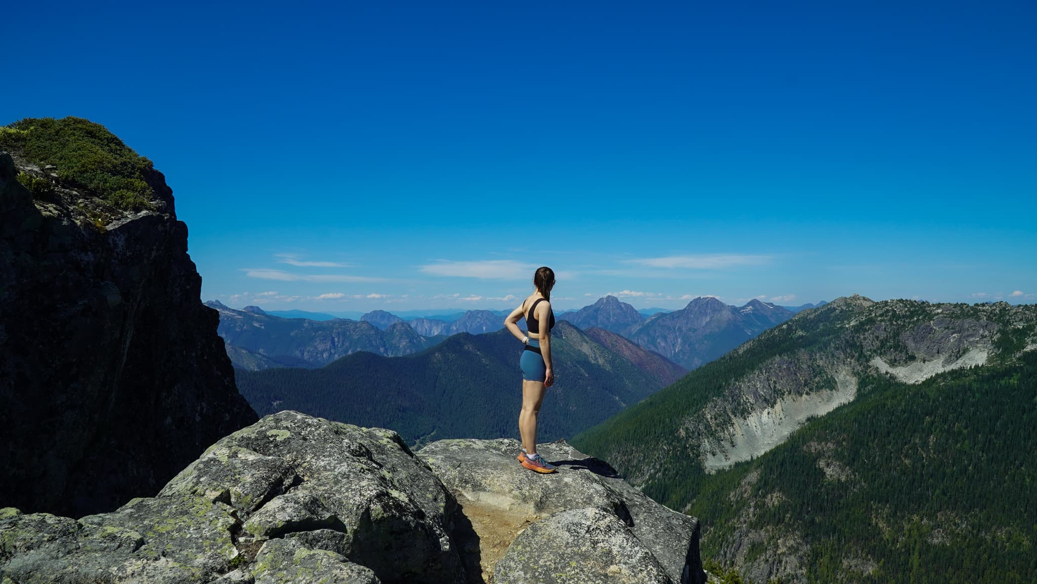 Mariia frames — Cascade Range ridgeline in Lululemon activewear