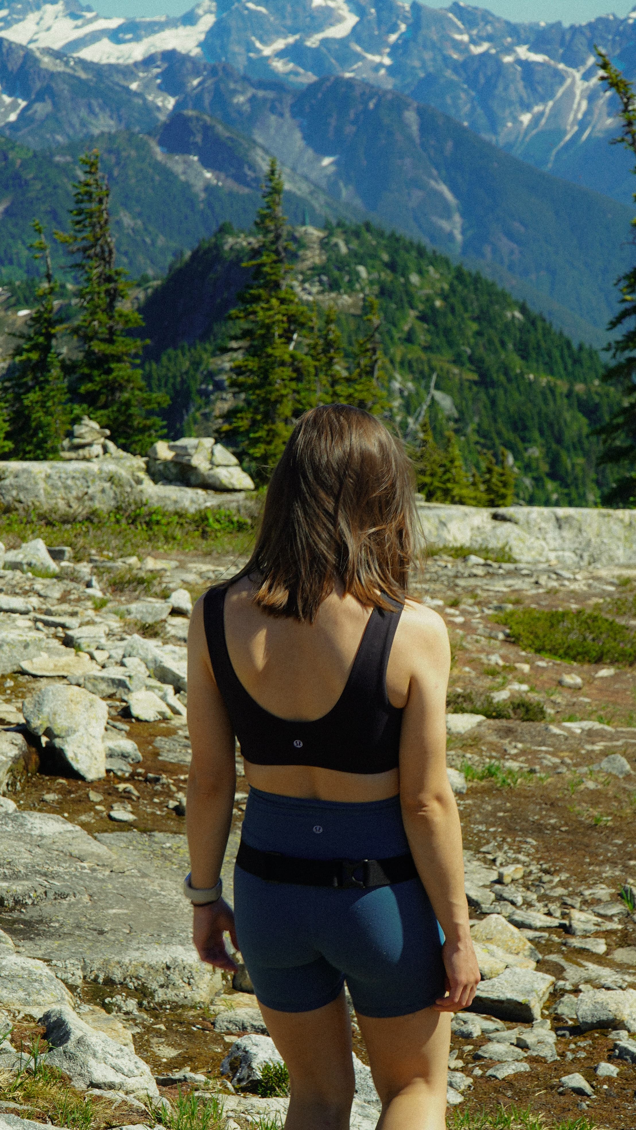 Activewear content — summit view on the trail